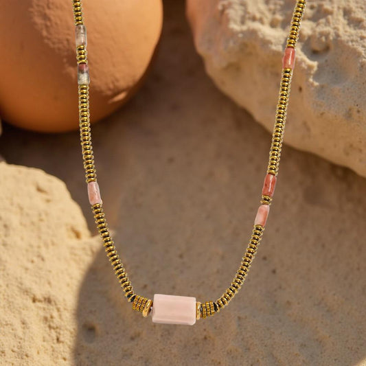 The Daisy Necklace blue and gold floral charm necklace | Handmade daisy charm necklace in blue and gold | Elegant floral charm necklace for women | Blue and gold necklace with daisy details | Artisan handmade floral necklace | Daisy inspired charm necklace close up | Lightweight everyday floral necklace | Boutique handmade necklace photography | Feminine blue and gold charm necklace | Layering necklace with floral design | Unique daisy charm necklace | Gold tone necklace with blue accents 