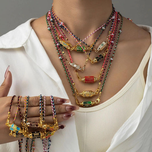 The Zara Rope LOVE necklace gold chain | Gold rope chain necklace with LOVE pendant | LOVE letter necklace gold tone | Statement rope chain LOVE necklace | Elegant gold LOVE necklace for women | Modern rope chain necklace close up | Layering necklace with LOVE pendant | Minimalist gold LOVE necklace | Fashion jewelry rope chain necklace | Romantic LOVE pendant necklace | Stylish gold rope necklace | Everyday gold LOVE necklace | Trendy rope chain LOVE necklace | Boutique gold LOVE necklace photography 